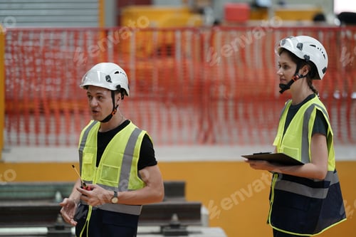 Preview: Two Technicians or Engineers Checking and maintaining Machine Equipment of train in station.