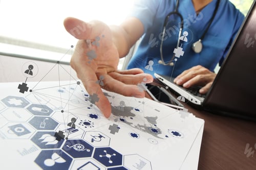 Preview: Doctor Working With Laptop Computer In Medical Workspace Office And Medical Network Media Diagram