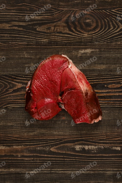 Preview: Overhead view of raw deer boneless ham