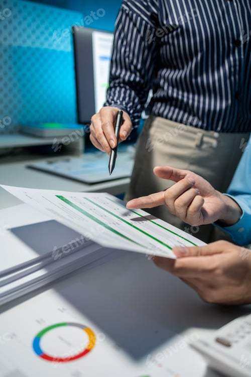 Preview: using computer together in office, successful business people working together in a co-working offic