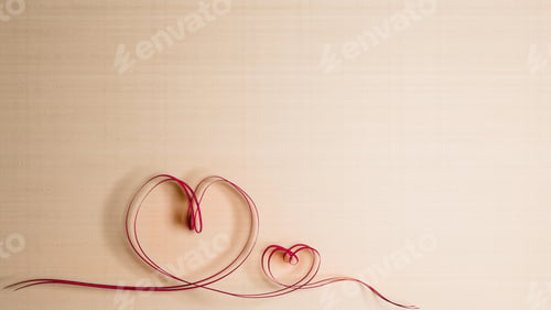 Preview: Ribbon to heart shape on wooden background
