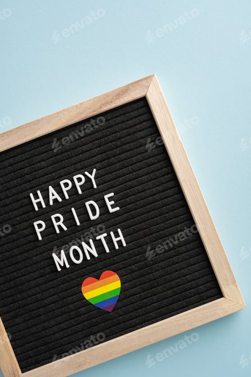 Preview: Vertical photo of letter board displaying 'Happy Pride Month' message