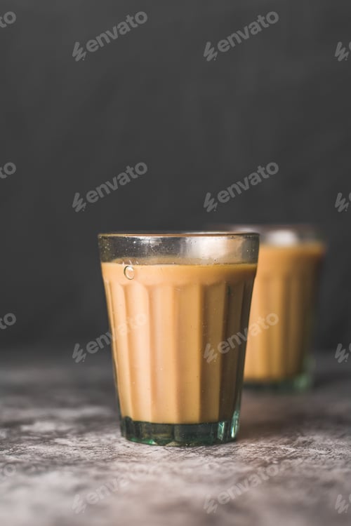 Preview: Indian chai in glass cups with masalas to make the tea.
