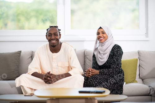 Preview: african couple at home reading quaran