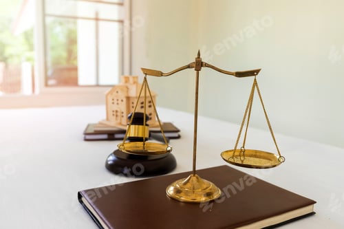 Preview: Gold brass balance scale isolated on book, Symbol of law and justice.