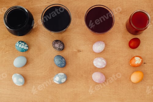 Preview: Colorful painted easter eggs on wooden table