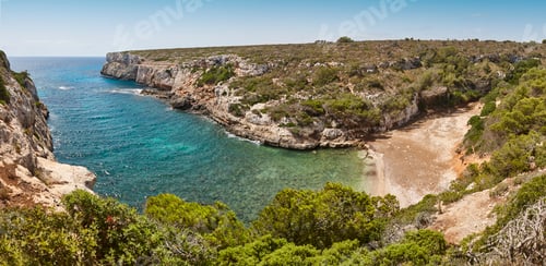 Preview: Turquoise waters in Mallorca. Bota cove. Panoramic mediterranean coastline. Spain