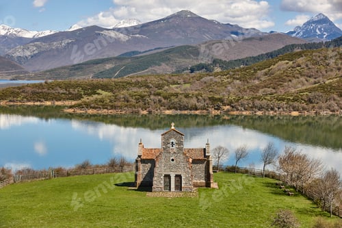 Preview: Picturesque chapel of Quintanilla in Riano mountain lake landscape. Spain
