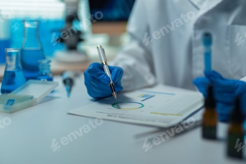 Preview: Scientist analyzing experiment data in laboratory