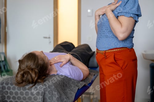 Preview: Woman receiving a physical therapy session