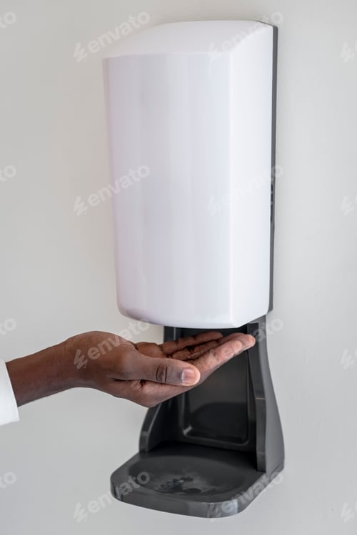 Preview: Alcohol gel dispenser on a wall in the new normal