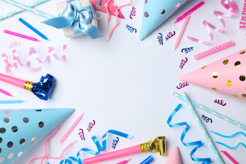Preview: Flat lay composition with birthday party items on light background