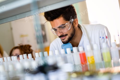 Preview: Group of medical scientists working at the laboratory. Research virus people concept