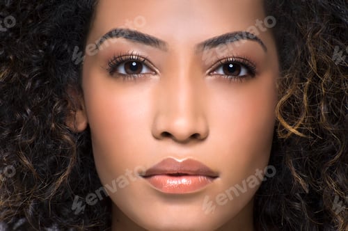 Preview: Close up studio portrait of beautiful young woman