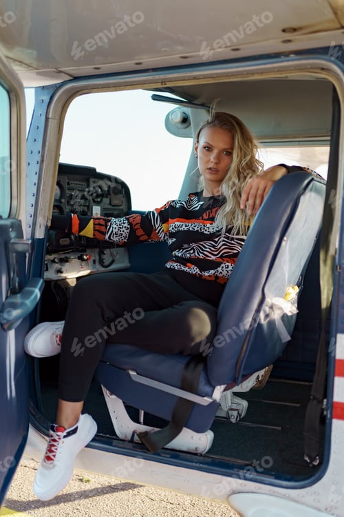 Preview: Young woman piloting a plane
