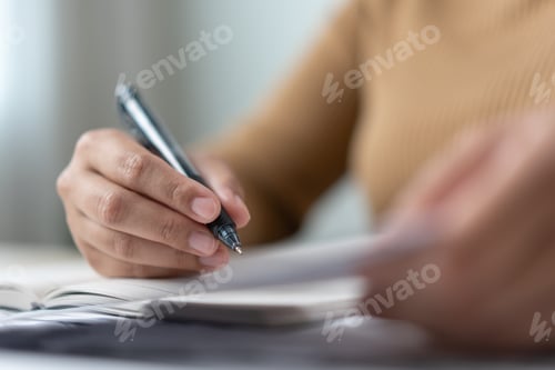 Preview: Woman do home money account calculate on book