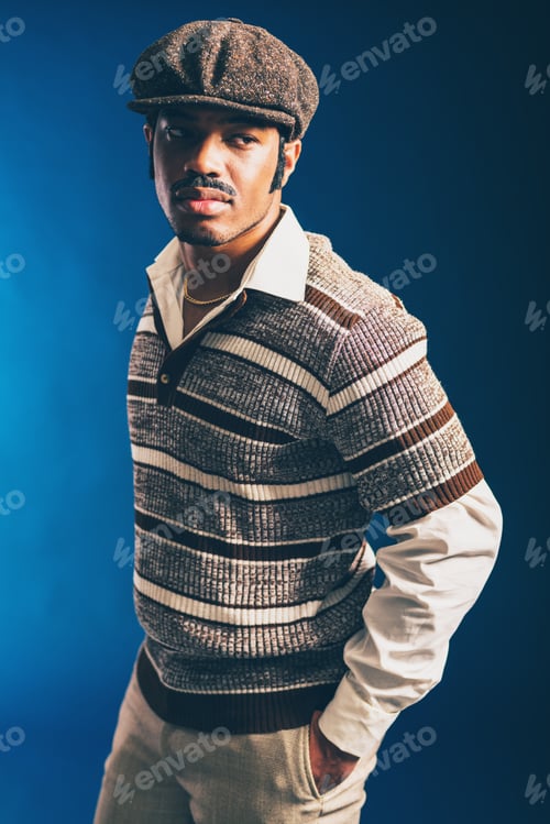 Preview: Close Up Portrait Of A Gorgeous Stylish Afro Guy, Wearing Long Sleeved Stripes Shirt And Cap