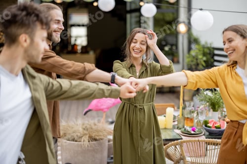 Preview: Young friends in face masks gathering for birthday party