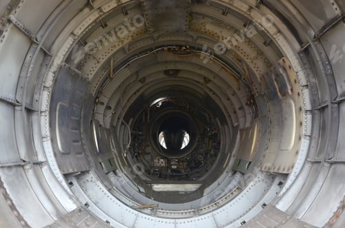 Preview: The inner metal lining of empty military fighter. Inside view of abandoned aircraft