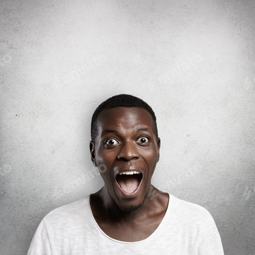 Preview: Human face expressions and emotions. African customer or employee dressed casually looking in surpri