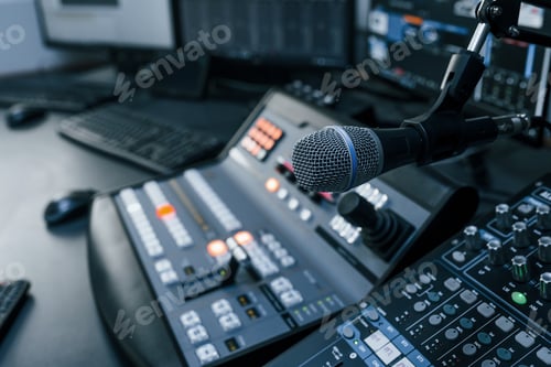 Preview: Close up view of radio mixing desk with professional sound equipment