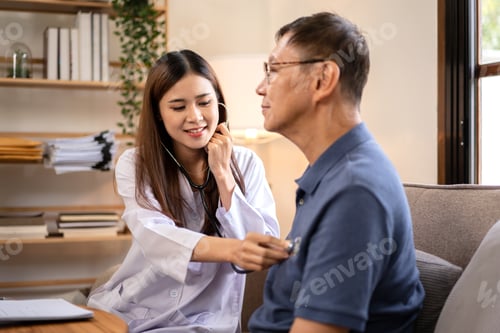 Preview: Female doctor visit male elderly patient at home while using ste