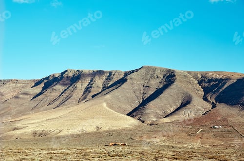 Preview: Volcanic hills and blue sky