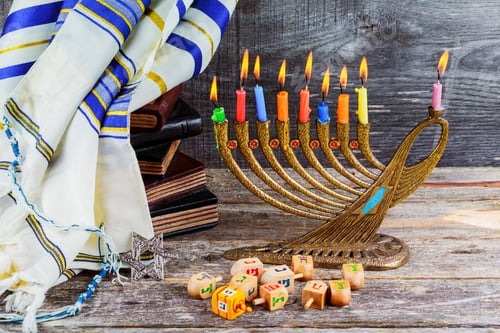 Preview: jewish holiday Hanukkah with menorah traditional Candelabra and wooden dreidels spinning top retro
