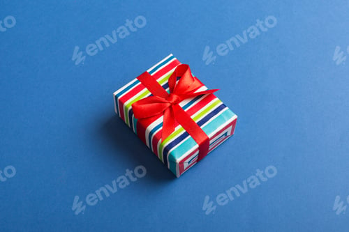 Preview: Wrapped christmas or other holiday handmade present in paper