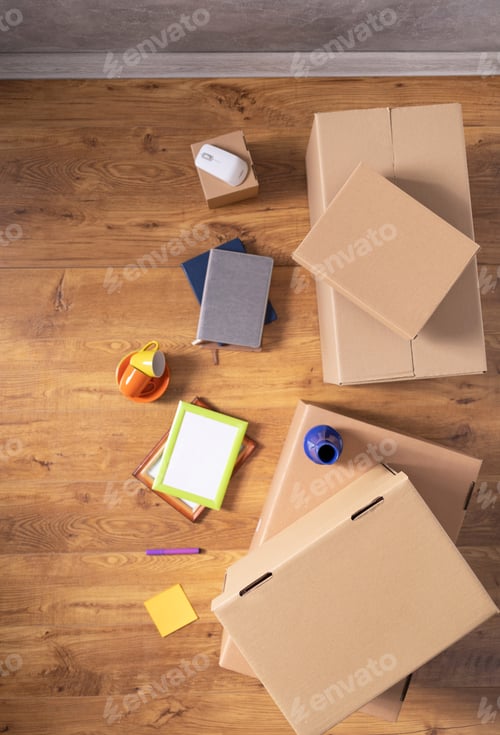 Preview: Stack of cardboard box on floor laminate background. Empty box case top view