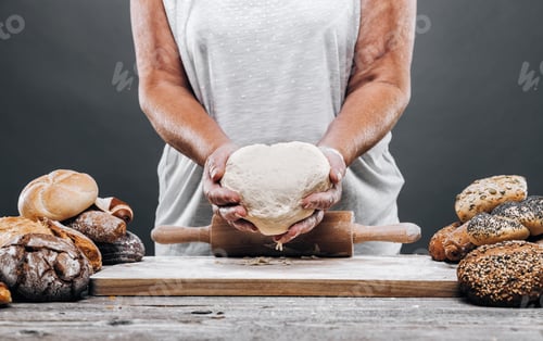 Preview: Baker preparing delicious fresh bread and pastry
