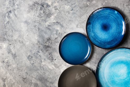 Preview: Empty Blue Plates on Grey Background