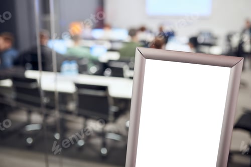 Preview: blank sign on the background of people at the conference