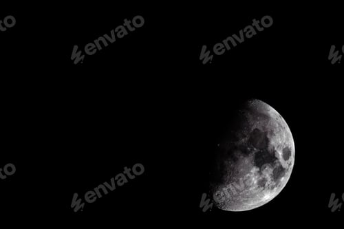 Detailed Close-Up of the Moon Against Black Sky