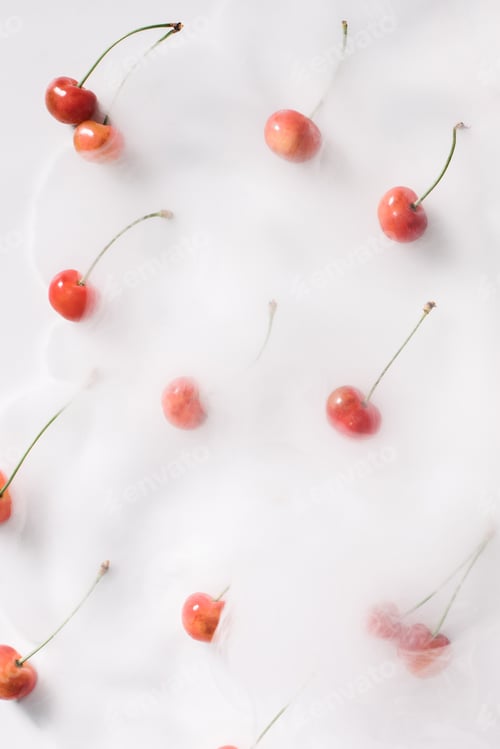 Preview: top view of fresh ripe cherries in smoke on white, organic background