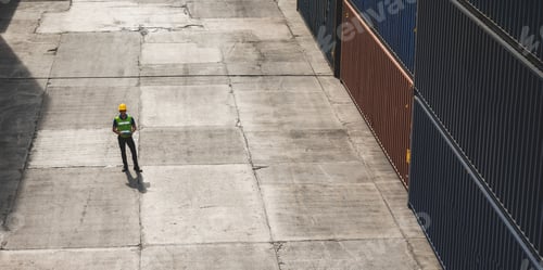 Preview: logistic worker teamwork and partner of foreman, engineer, and businessman working on container yard