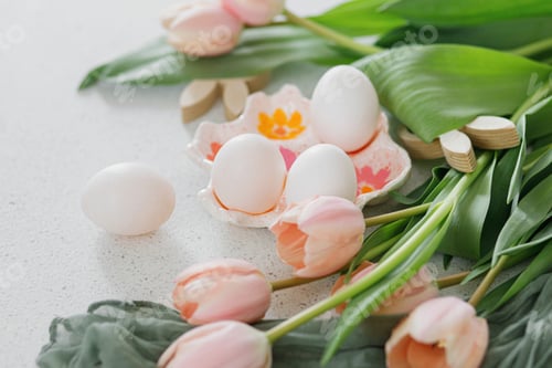 Preview: Happy Easter! Beautiful tulips, natural eggs and bunny decoration on modern table