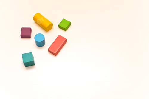 Preview: Multicolored wooden figures of different shapes. concept. empty space,