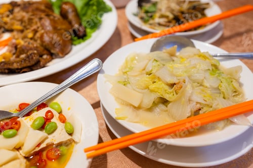 Preview: Chinese style stinky tofu with lots of others dishes in restaurant