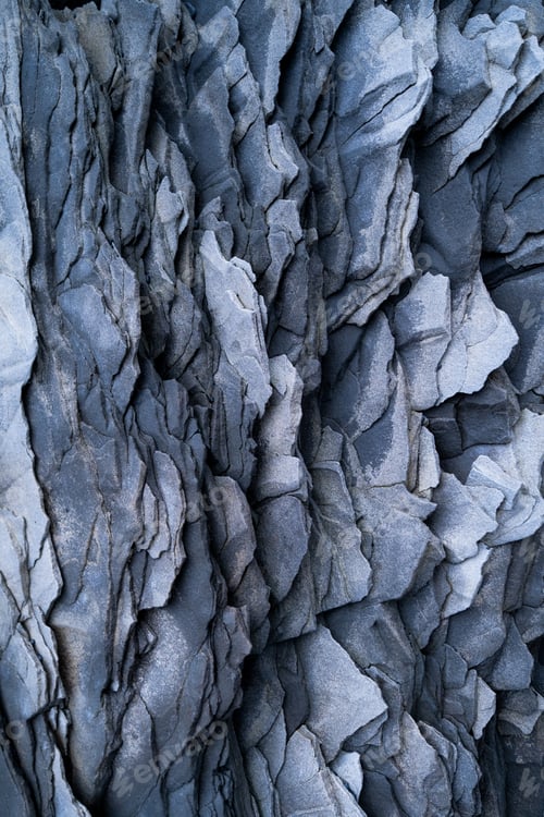 Preview: Basalt stones as a background. Image for background and wallpaper. Sharp rocks.