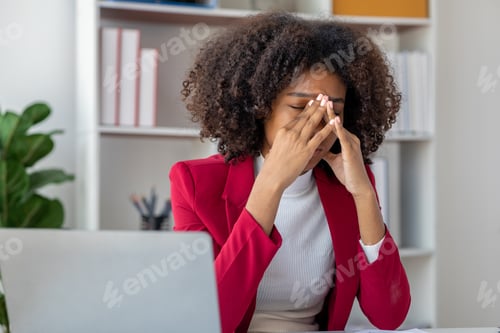 Preview: American woman is start-up businesswoman, she sits in the office and suffers from the stress of work