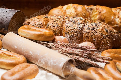 Preview: Cooking. Delicious bread, bagels and eggs on the table
