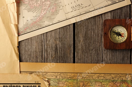 Preview: Antique compass over old map