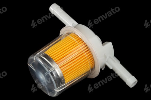 Preview: Car fuel filter, isolated on black background