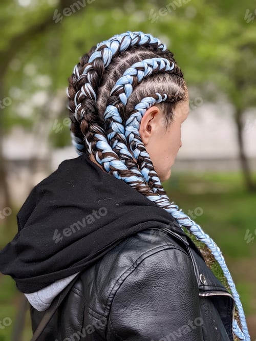 Preview: A girl with blue braids looking away || Cold weather || Beautiful hairstyle || Flower