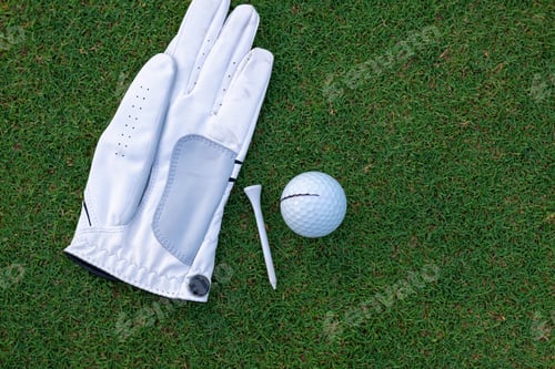Preview: Golf ball putting on green grass near hole golf to win in game at golf course with blur background a