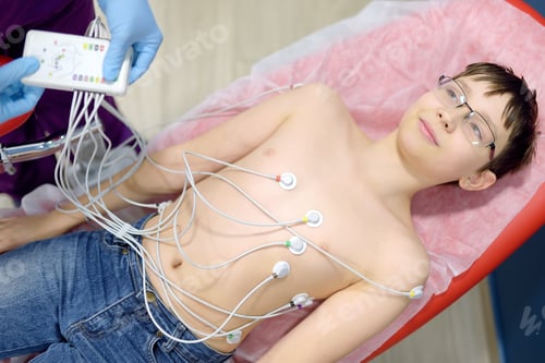 Preview: Child under ECG test with doctor