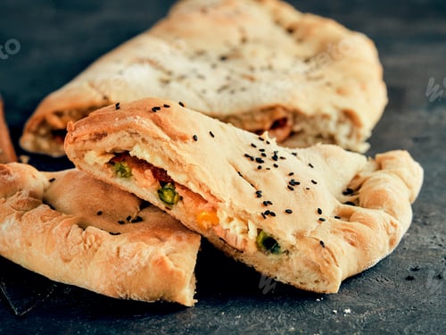 Preview: Closed pizza calzone, copy space