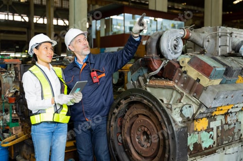 Preview: A businessman maintenance work at an old factory