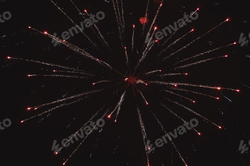 Preview: Festive multicolored salute on the background the dark night sky. Salute from the pyrotechnics.